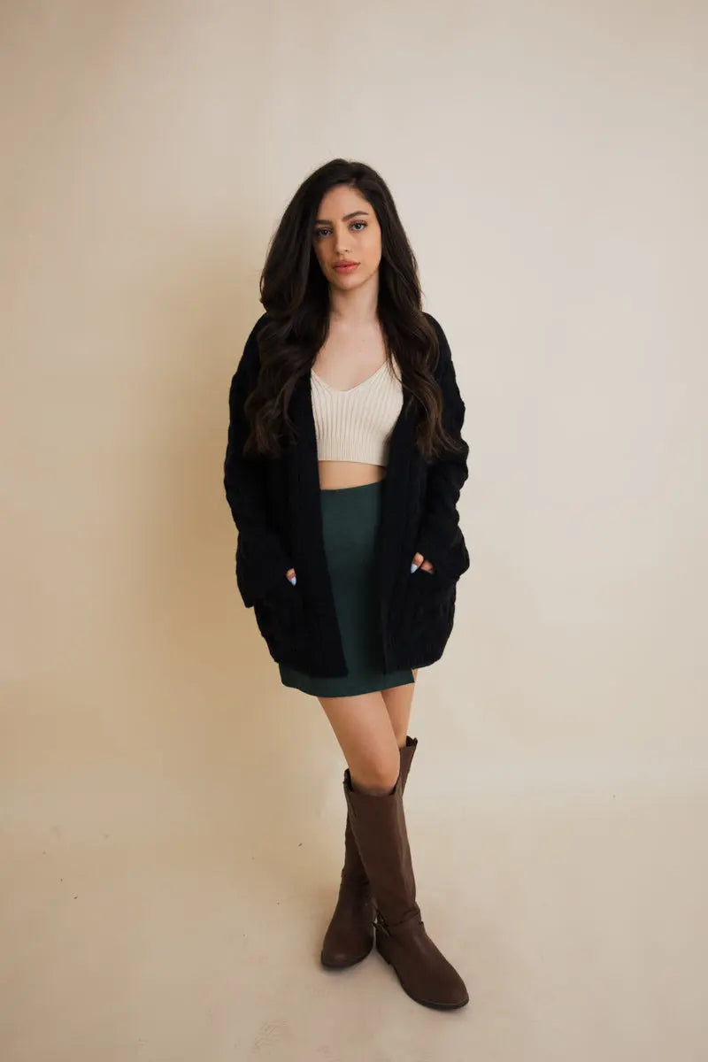 Black cable-knit open cardigan with long sleeves and chunky cable texture