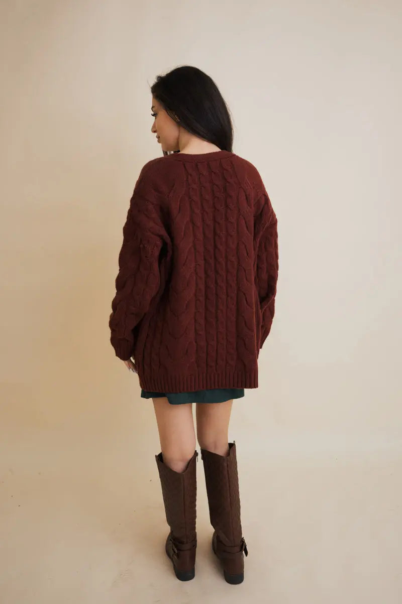 Burgundy cable-knit open cardigan, back view with long sleeves and cable pattern