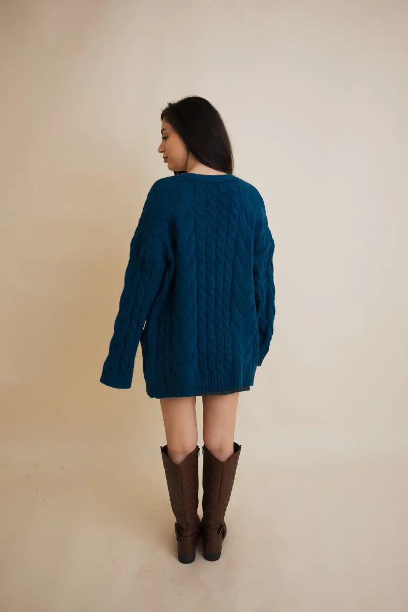 Teal cable-knit open cardigan, back view with cable pattern and long sleeves