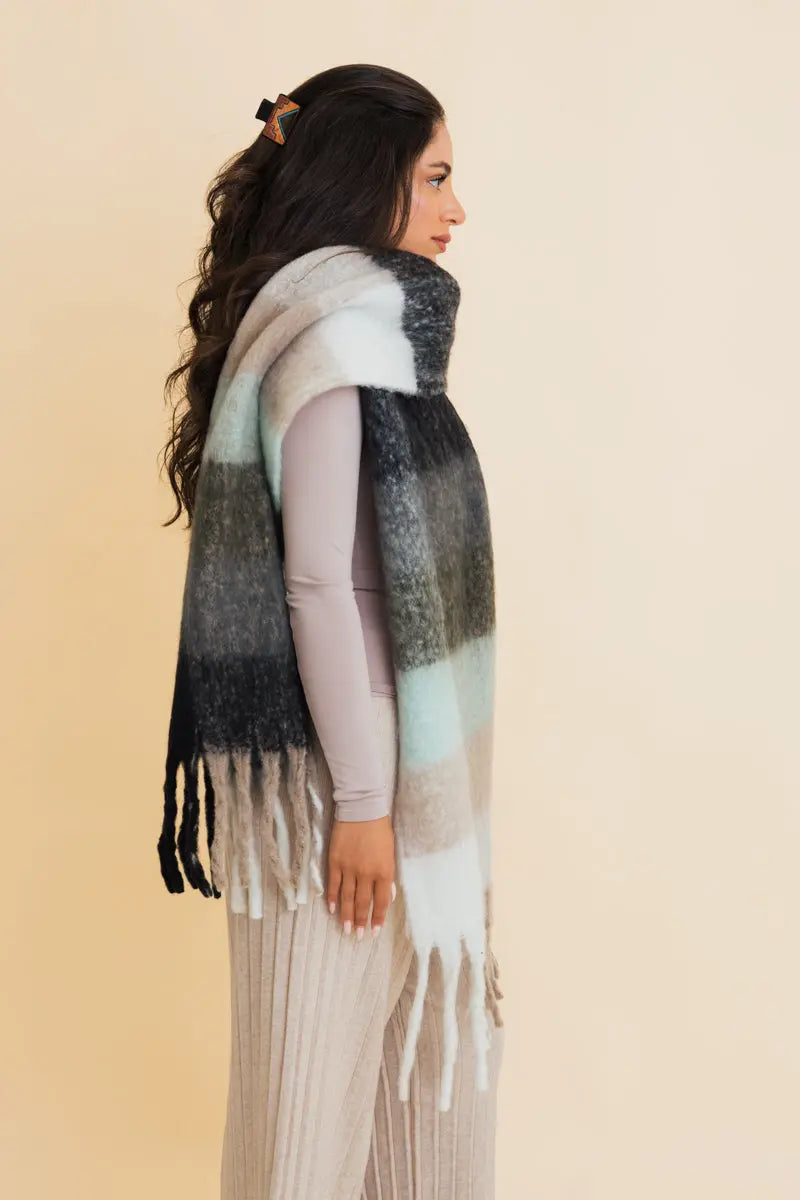Oversized plaid fringe scarf with front drape in dark navy and mint tones