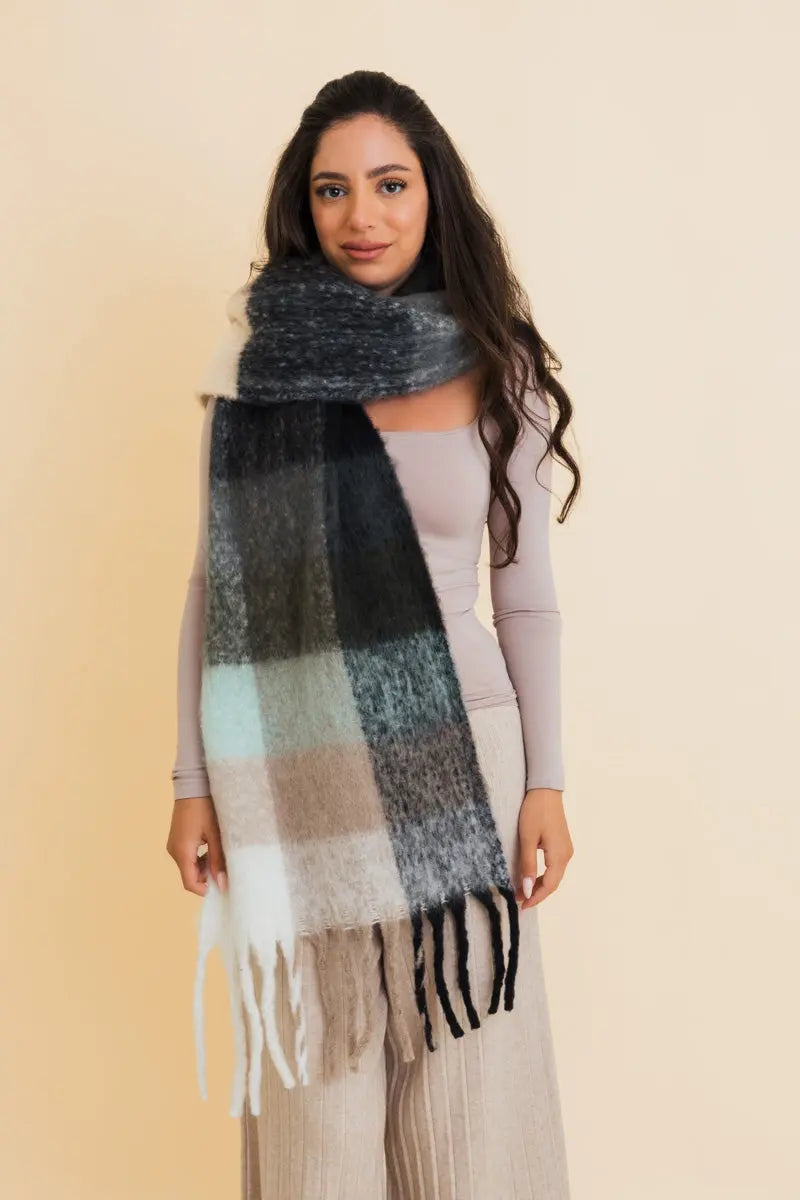 Oversized plaid fringe scarf in dark navy, light teal, and cream blocks