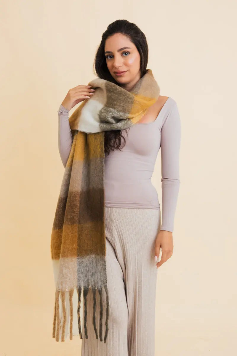 Oversized multicolor plaid fringe scarf in olive, mustard, gray, and white