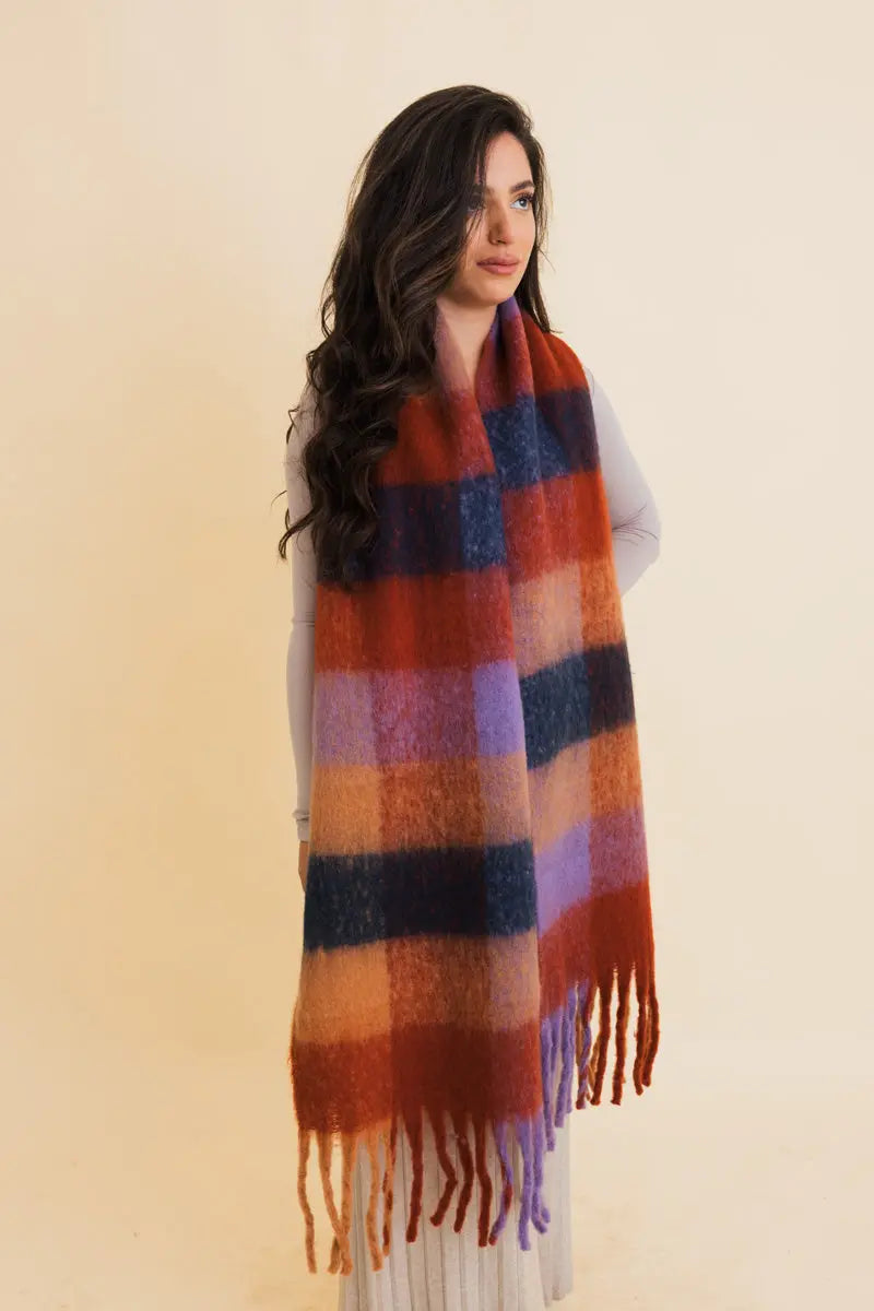 Oversized plaid fringe scarf with long tassels in rust and blue blocks