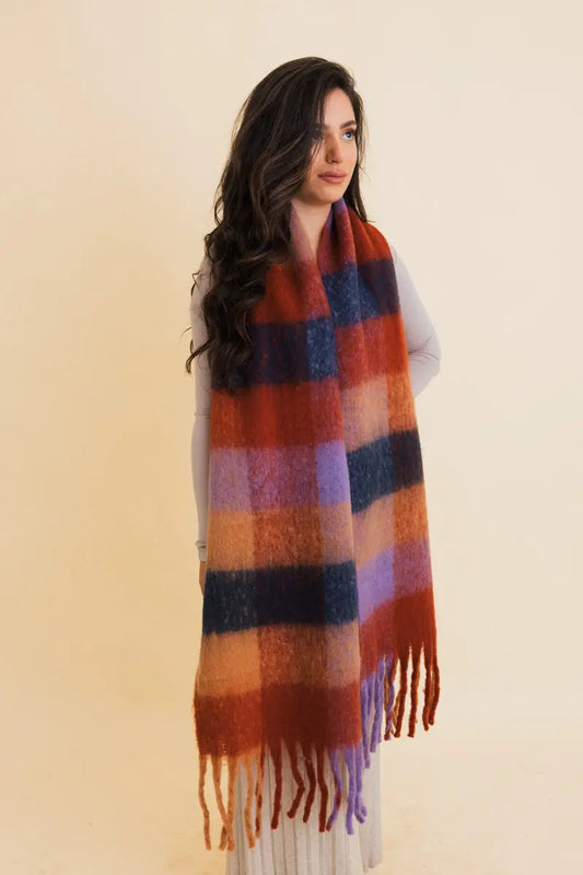 Oversized plaid fringe scarf with long tassels in rust and blue blocks
