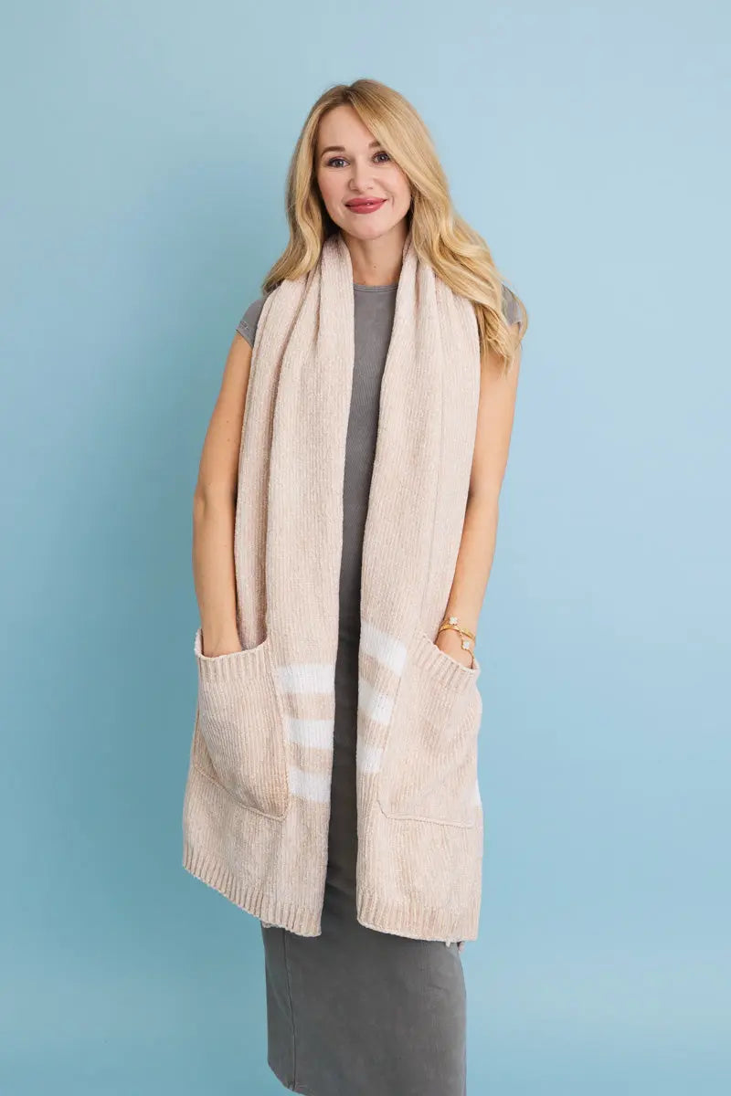 Beige chenille pocket scarf with two front patch pockets and bold striped border.