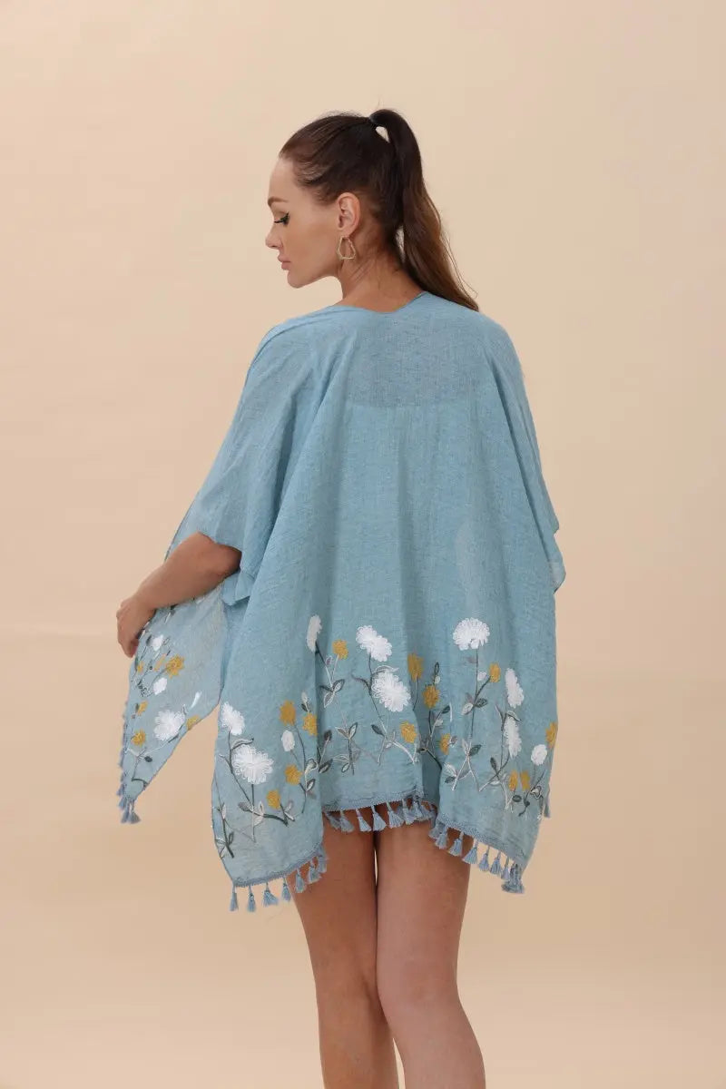 Blue floral embroidered kimono cardigan with tassel trim and wide batwing sleeves