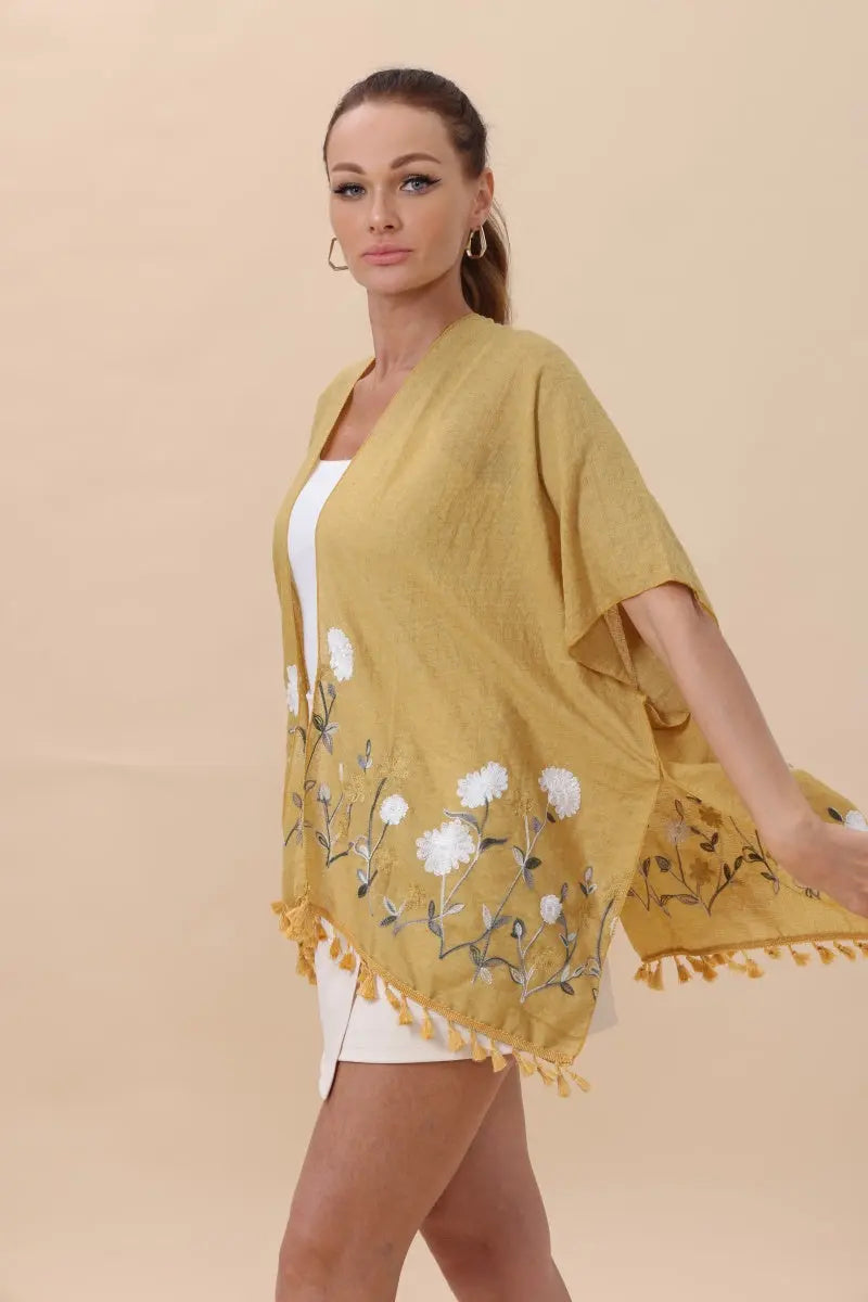 Mustard floral embroidered kimono cardigan with fringed hem and draped sleeves