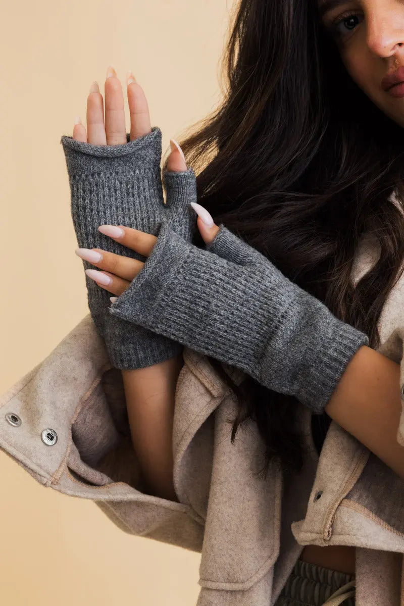 Grey knit open-finger mittens for winter warmth, phone-friendly cutout openings