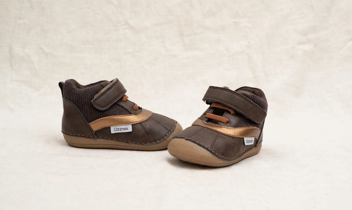 Kids barefoot boots shown together, dark brown with tan accents, hook-and-loop strap