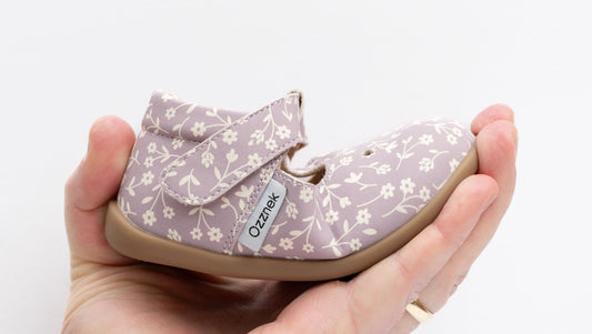 Kids floral T-strap Mary Janes in lavender with tan sole and hook strap detail