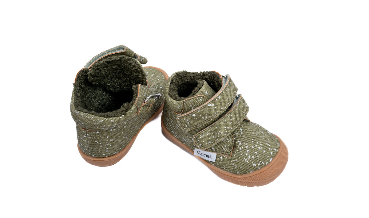 Olive toddler boots, sherpa-lined openings and hook-and-loop straps, tan outsole.