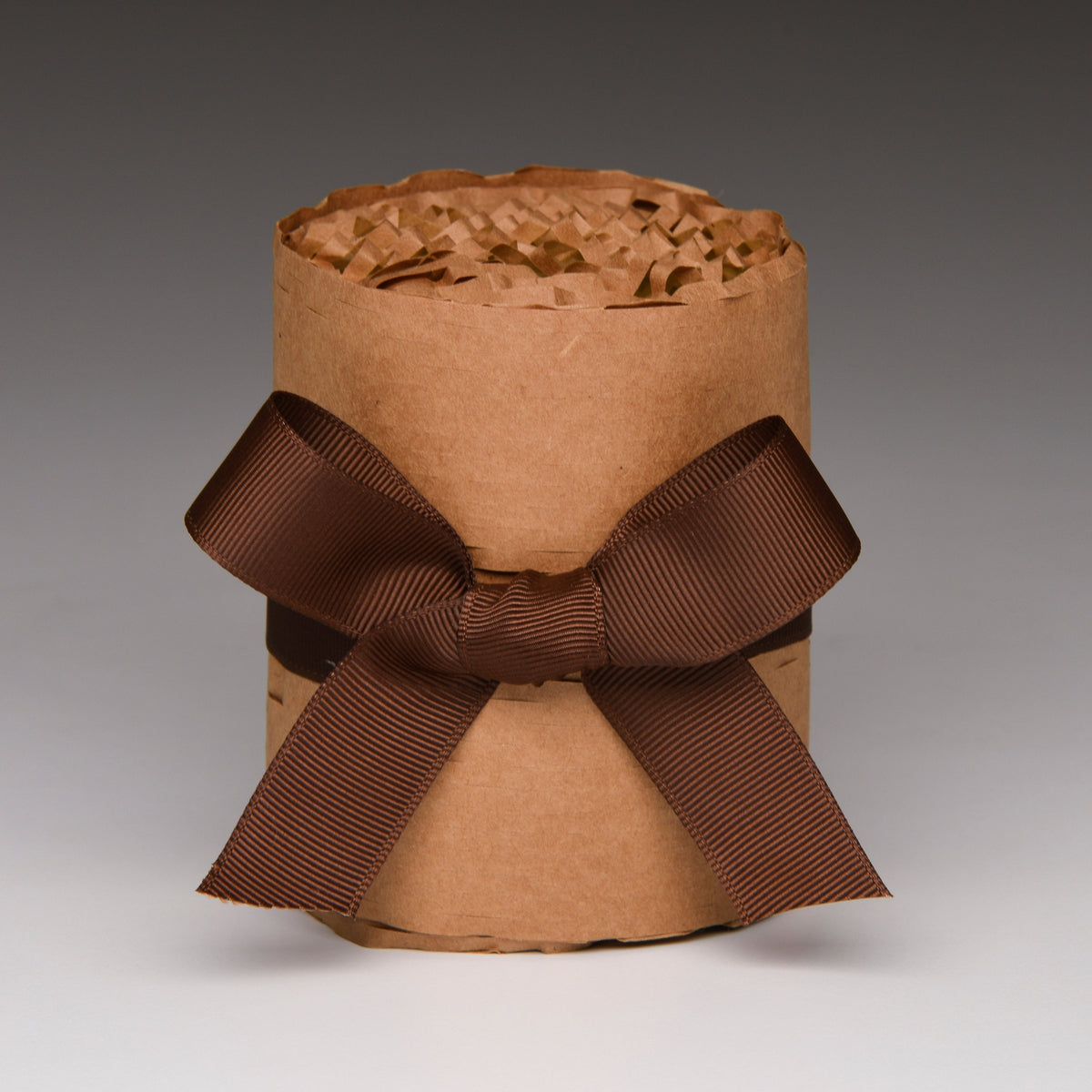Kraft gift wrap pouch with crumpled top and brown ribbon bow
