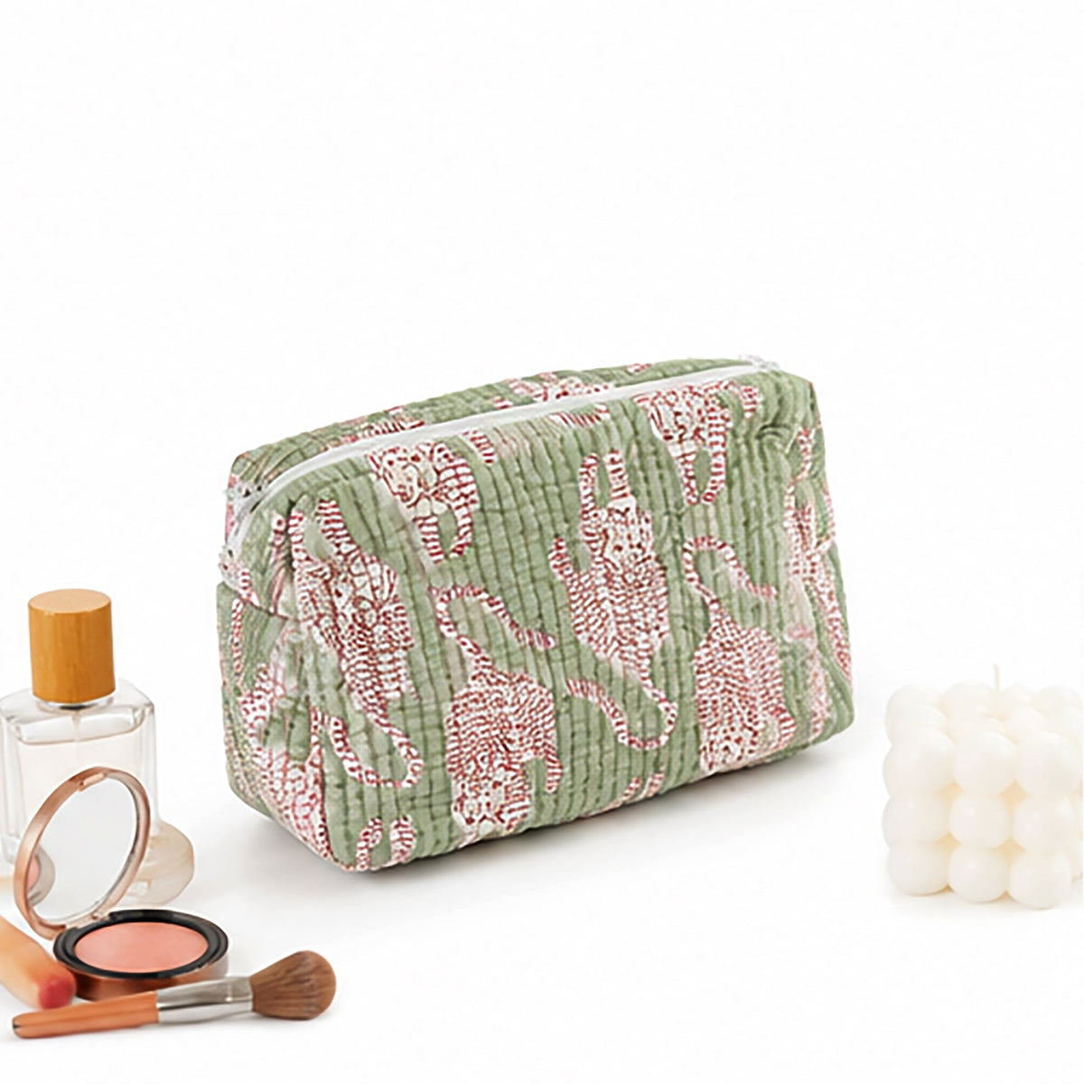 Green cat-print cosmetic pouch with rounded top zipper and full front panel.