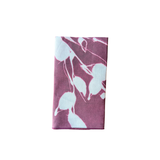 Aubergine floral print linen napkin, white pattern, folded rectangle
