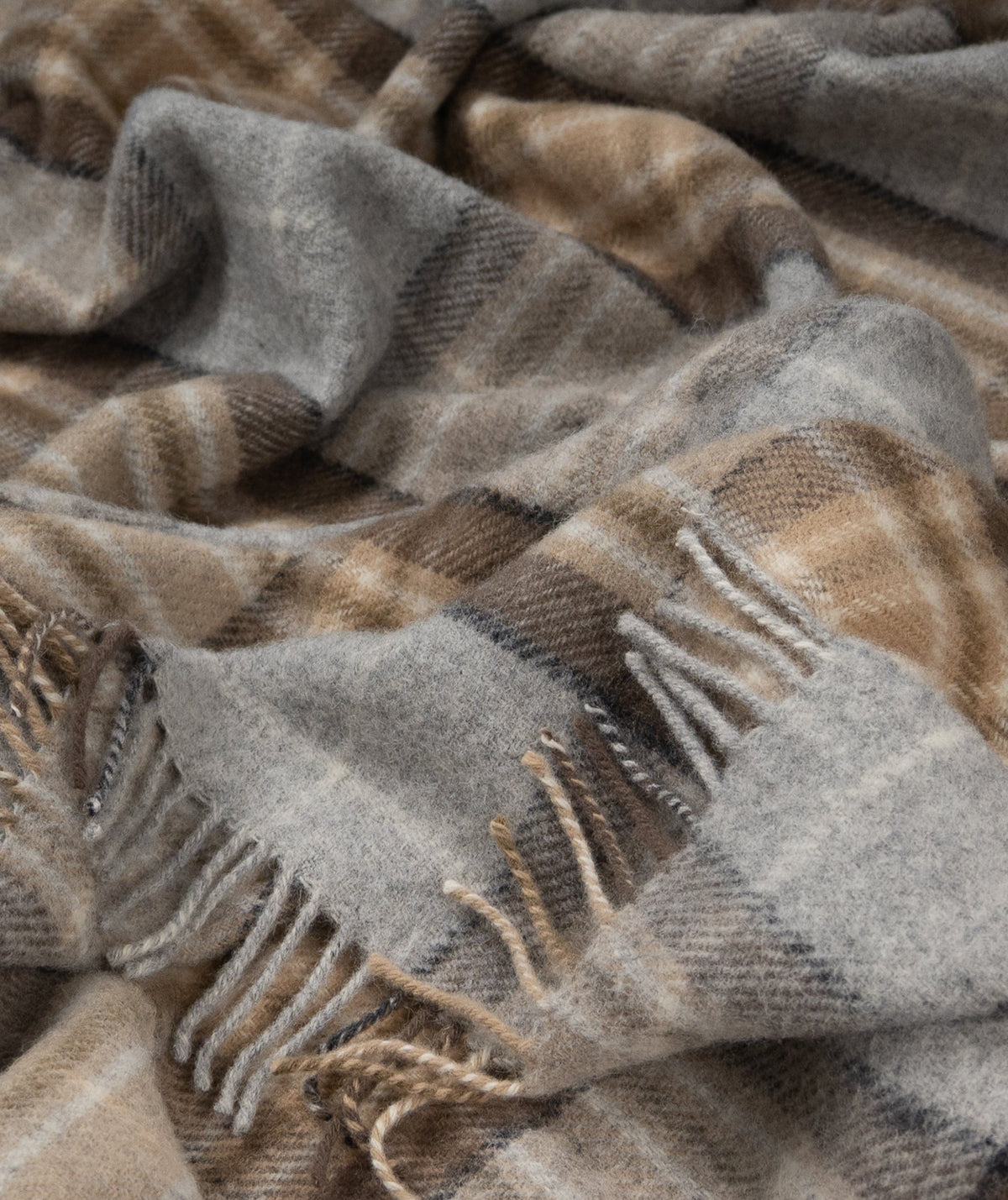 Plaid wool throw blanket in gray, tan, with fringe tassels
