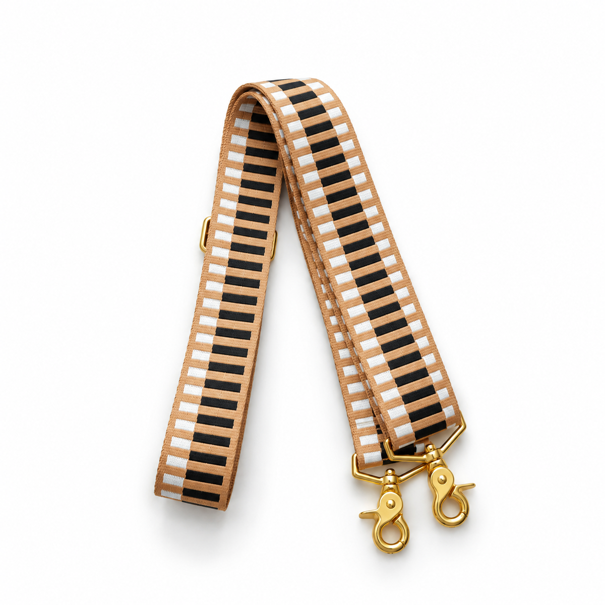 Guitar strap in beige with black-and-white geometric stripe webbing and gold clips