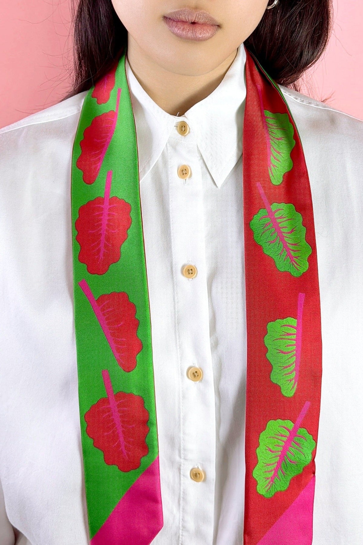 Twilly ribbon scarf in green and magenta leaf print worn with a white button shirt