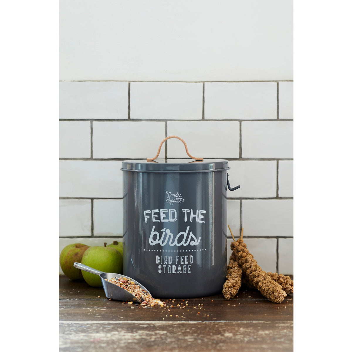 Charcoal bird feed storage tin with lid handle, front text branding, and metal hook