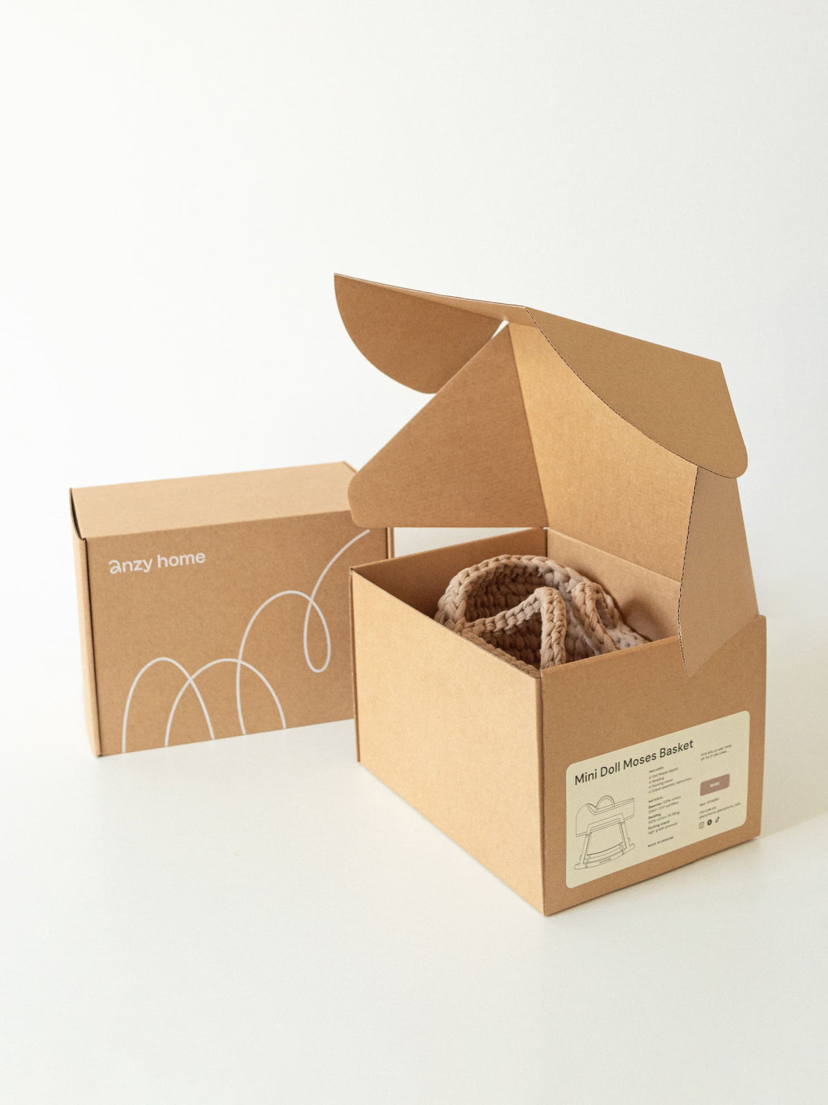 Mini doll moses basket set in open box with woven basket inside and accessories