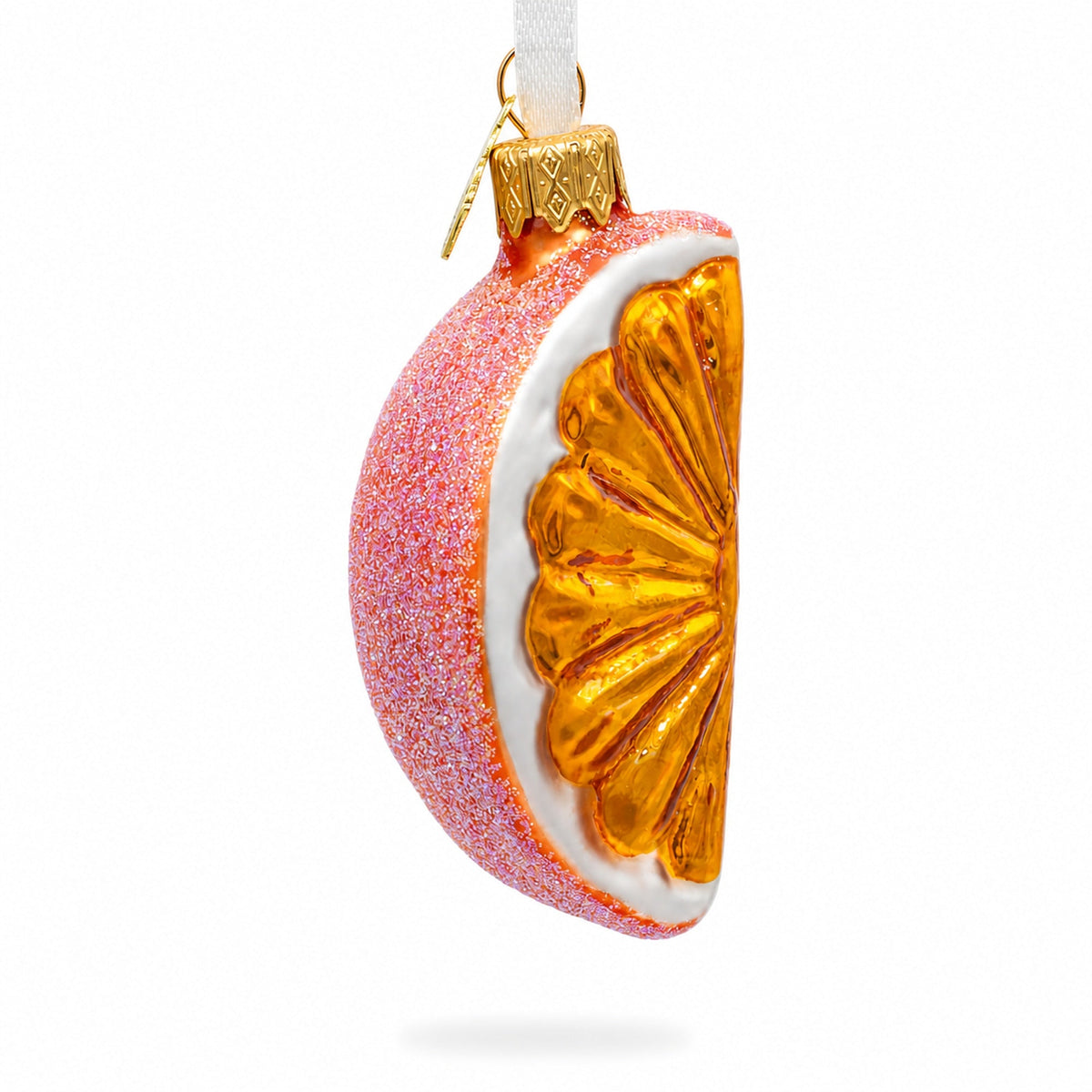 Glass citrus slice ornament, orange glitter with white rind, hanging loop.