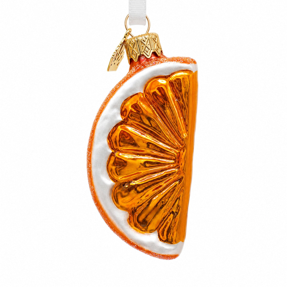 Close-up glass citrus slice ornament, orange glitter edge and gold textured rind, loop.