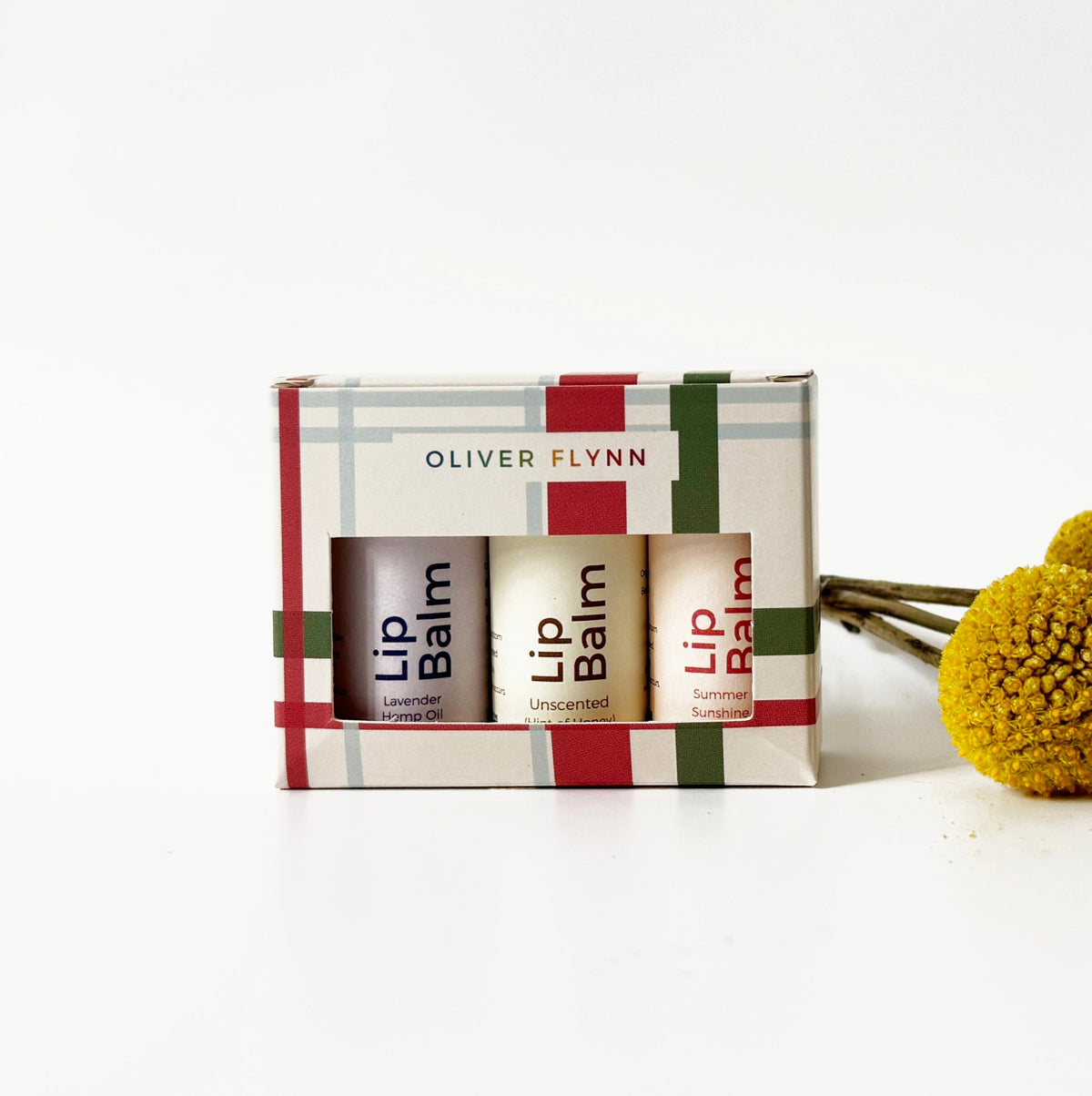 Oliver Flynn lip balm trio gift set box with three balm tubes
