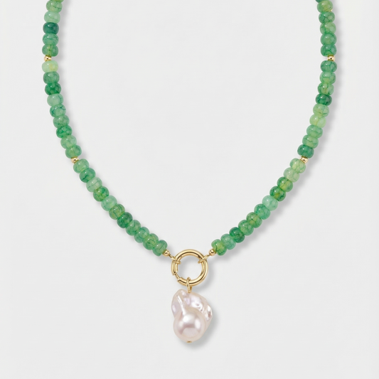 Green beaded pearl necklace with gold ring clasp and single pink pearl pendant