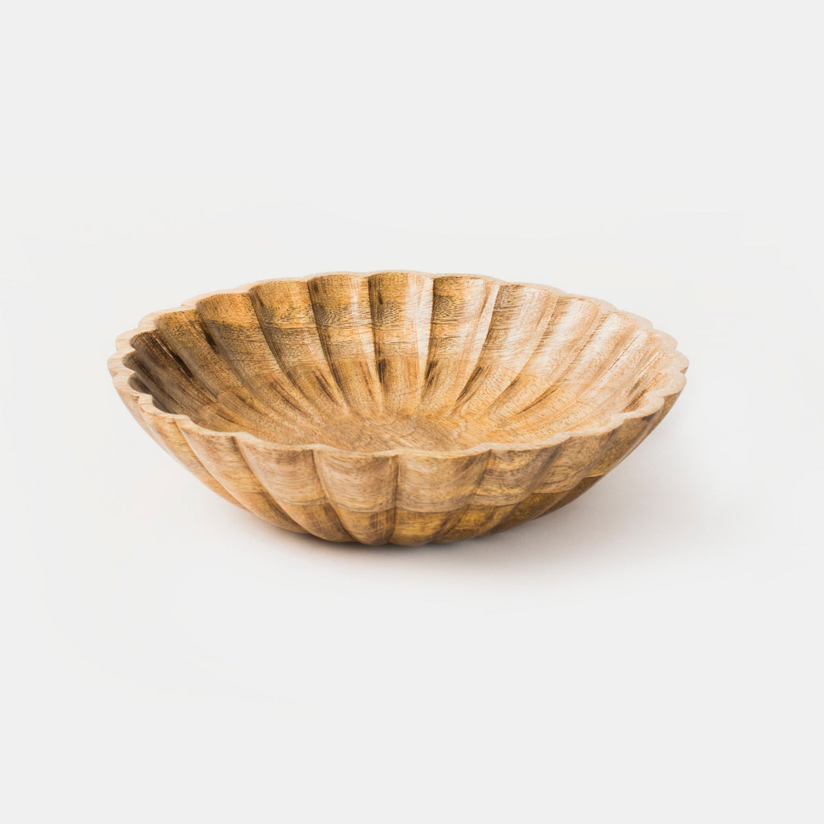 Scalloped natural wood bowl with fan-like ridges and carved grain