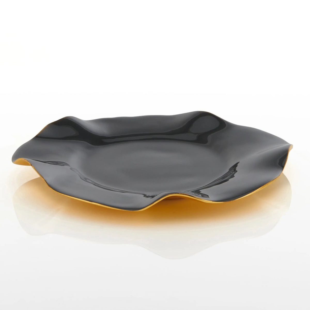 Graphite ruffled serving plate, side angle showing glossy glaze and gold-edged border