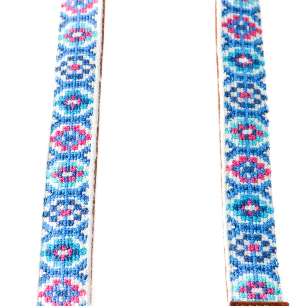 Mai woven bag strap close-up with blue base and blue/pink geometric pattern