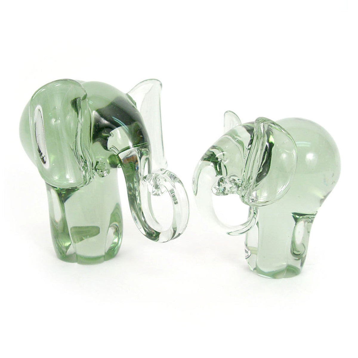 Pair of green-tinted glass elephant figurines, side-by-side profile