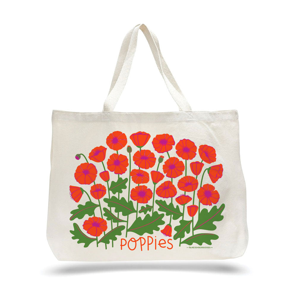 White canvas tote bag with red-orange poppy floral design and “Poppies” text on front.