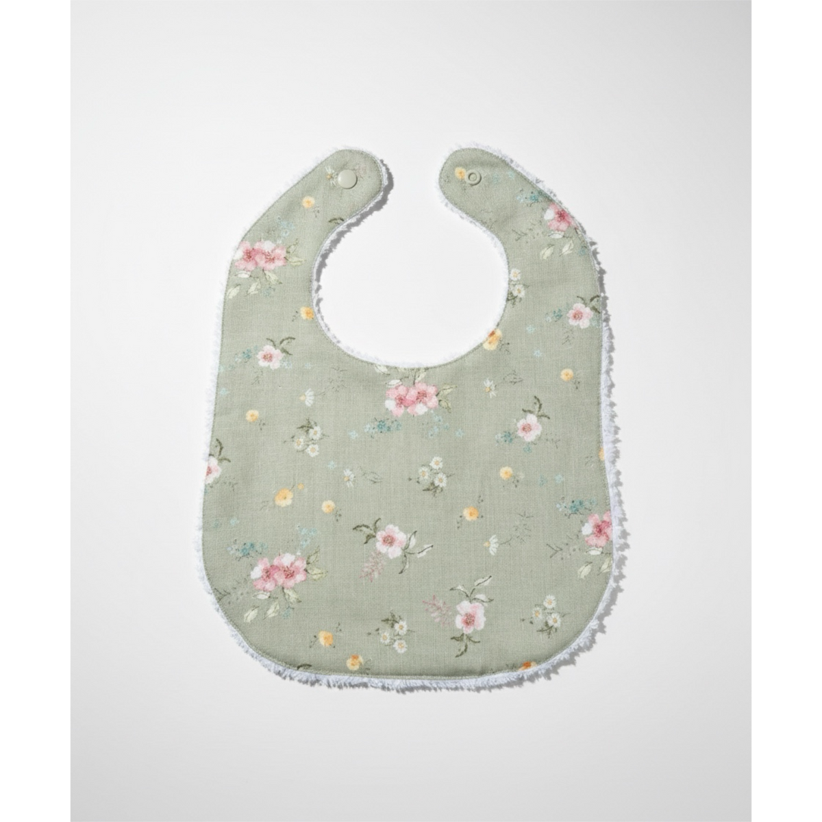Sage floral baby bib with rounded neckline, stitched edge, and snap tabs.