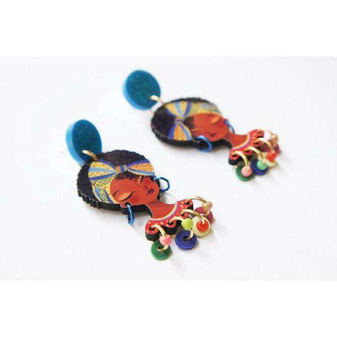 African girl face drop earrings with blue glitter discs and colorful red and green charms