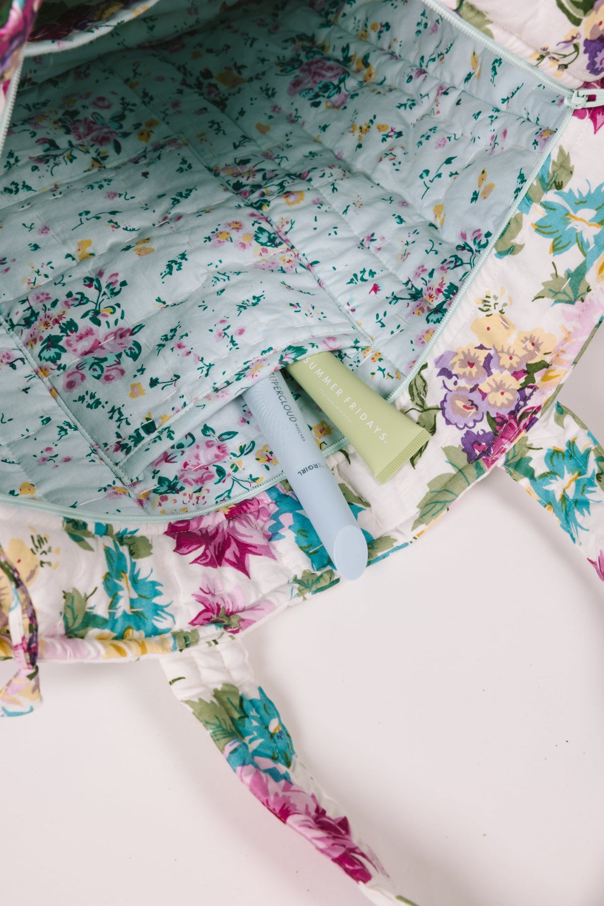 Floral zip tote bag interior with zipper pocket and pastel flower lining