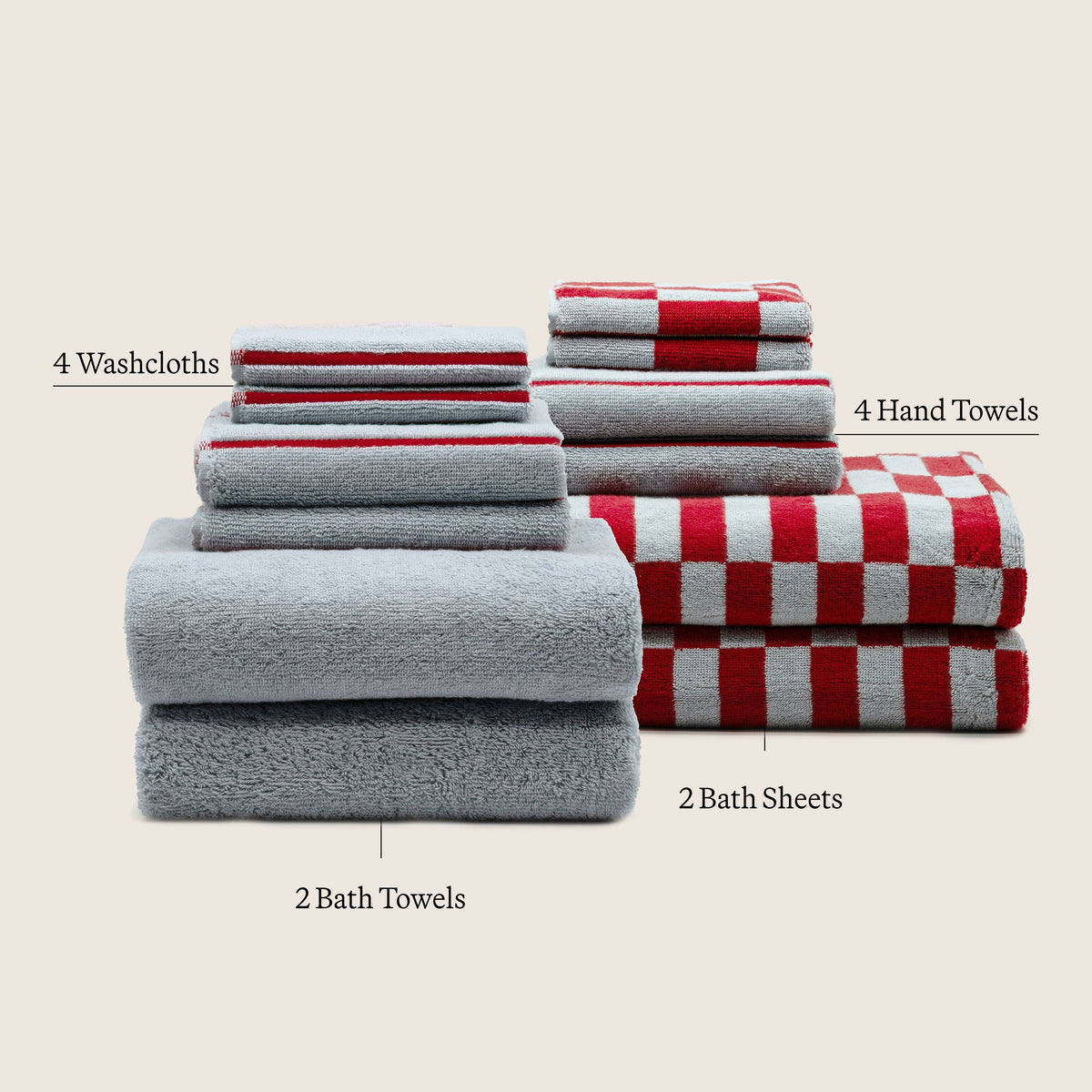 Gray and red-and-white check cotton towels in folded stacks