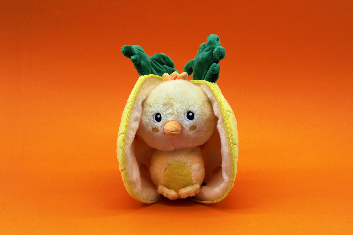 Pineapple plush flip pouch with chick inside, yellow shell and green leafy hood