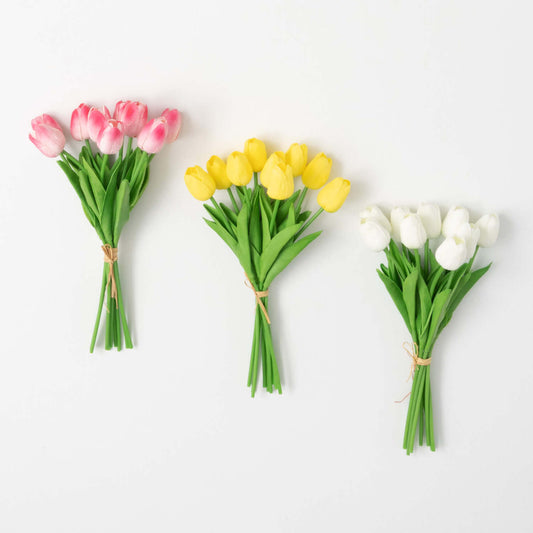 Three tulip flower bunches with green stems: pink, yellow, and white blooms.