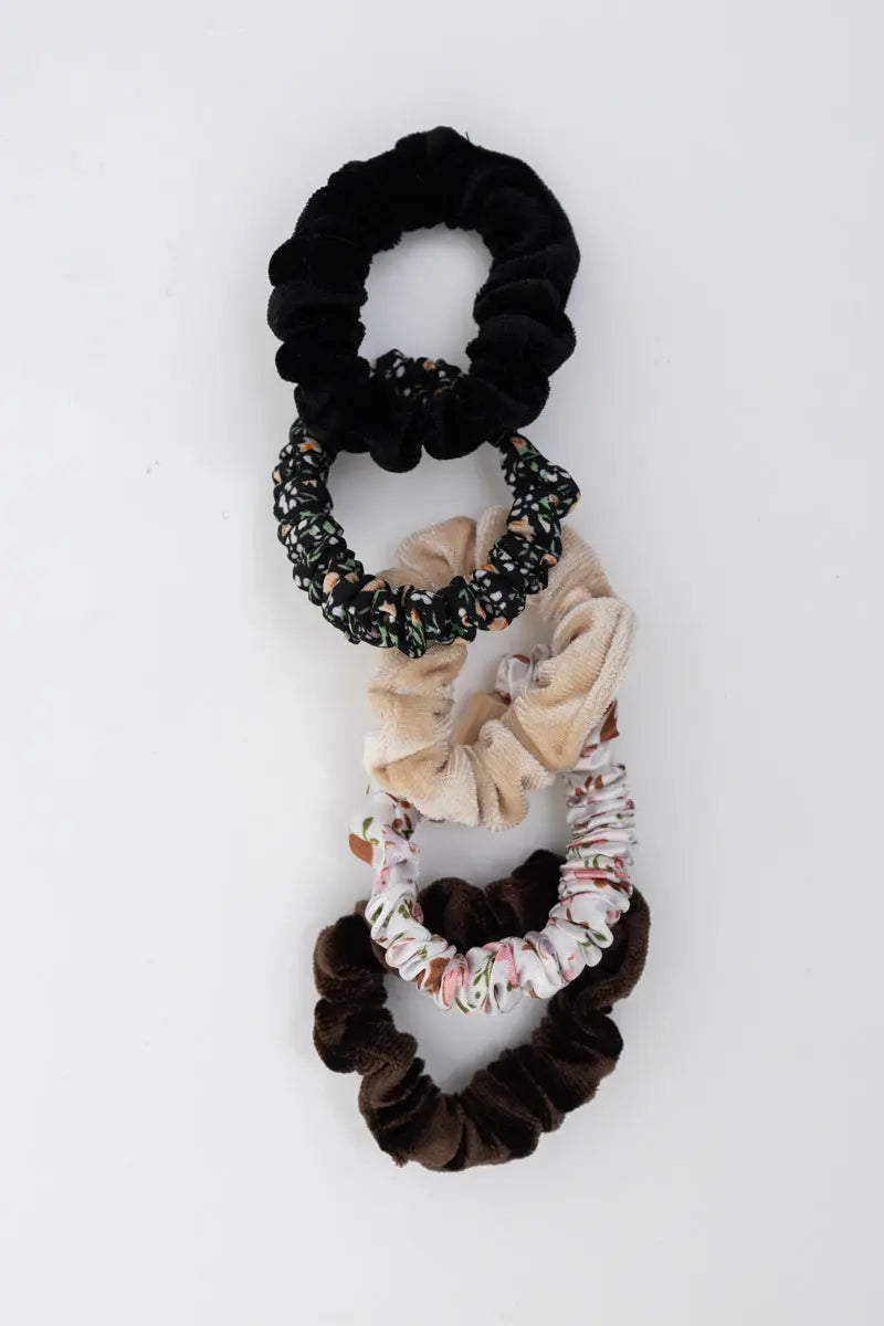 Set of hair ponytail scrunchies: black, beige floral, striped, and dark brown