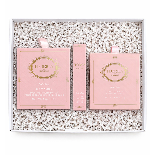 Jude Rose spa gift set with pink boxes and scented candle in tray