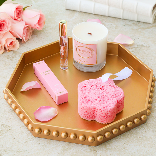 Jude Rose bath set on gold beaded tray: candle, spray, soap sponge, boxes