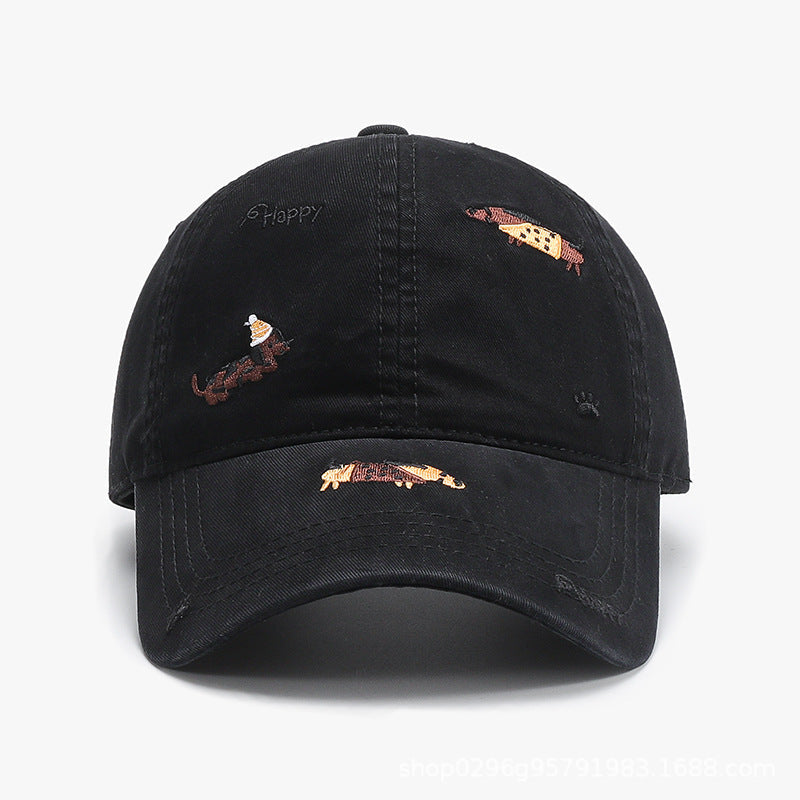 Black baseball cap with curved brim and embroidered animal motifs