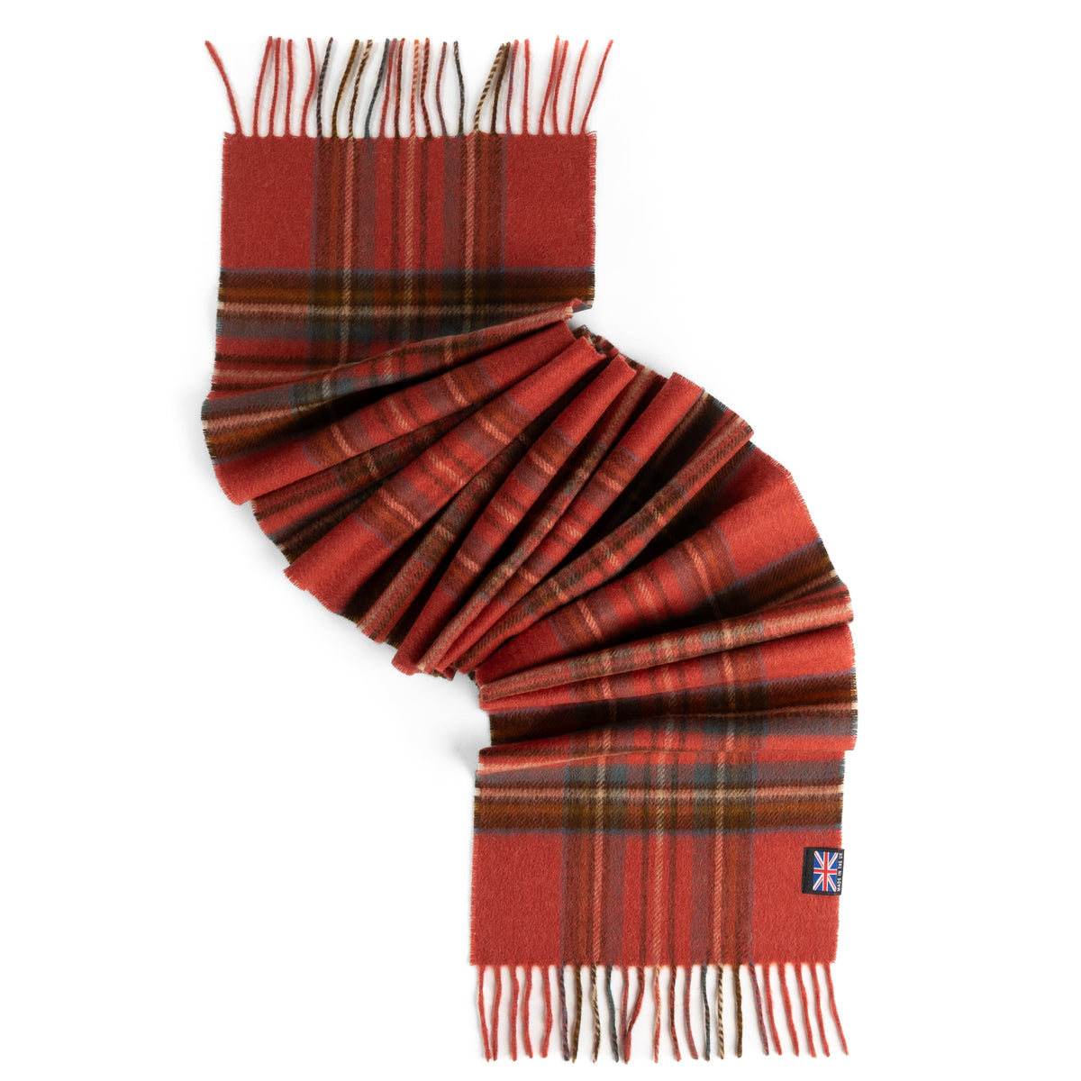 Red tartan merino lambswool scarf with folded drape, fringe trim, and UK flag patch