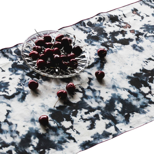 Grey marble-pattern runner with maroon border trim, flat corner detail