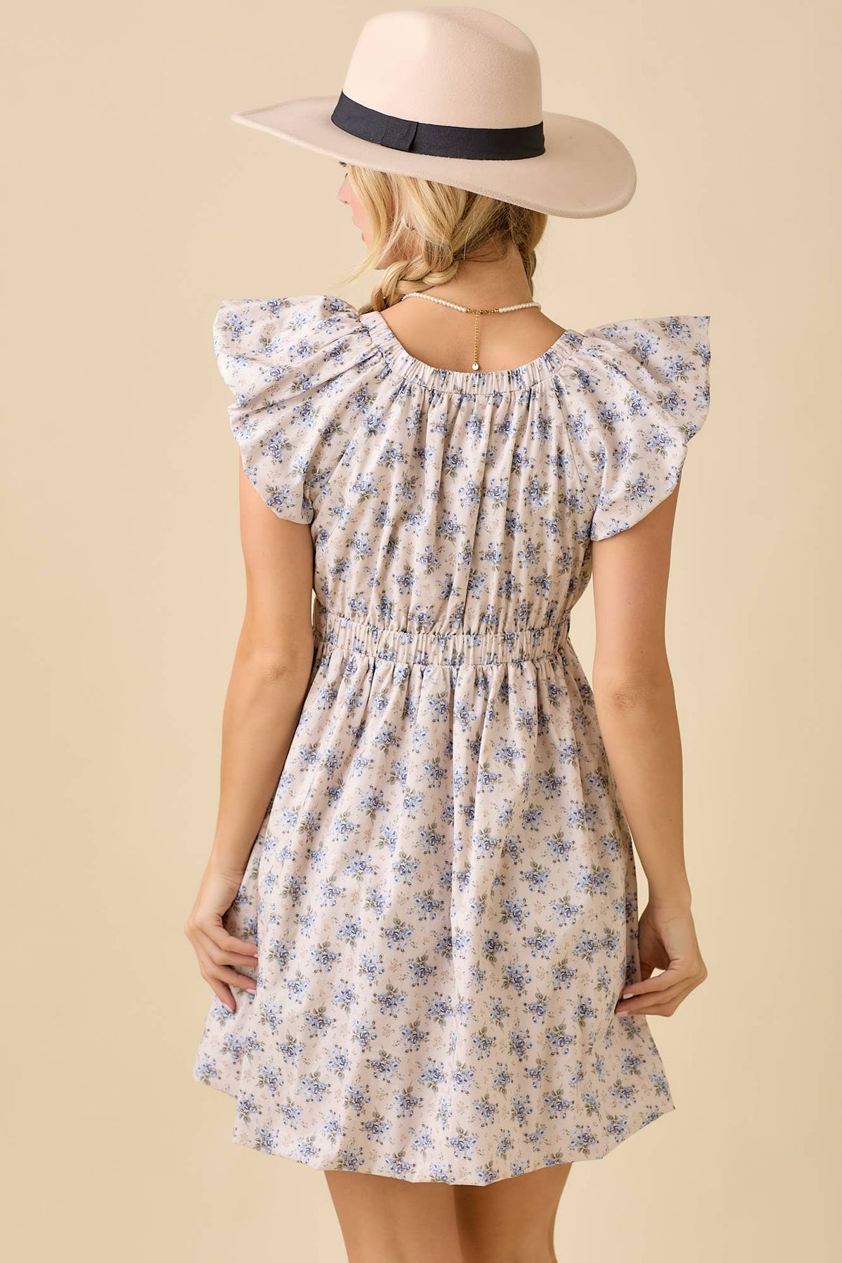 Floral mini dress back with gathered waist and ruffled sleeves