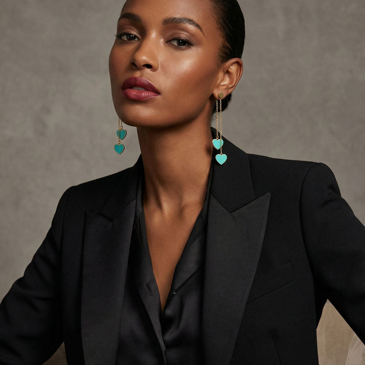 Double-heart drop earrings with turquoise charms on gold-tone hooks, long dangling style