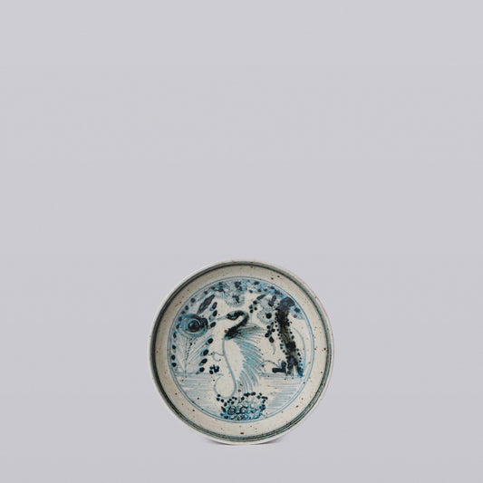 Small porcelain dish, round blue-and-white crane scene with speckled details