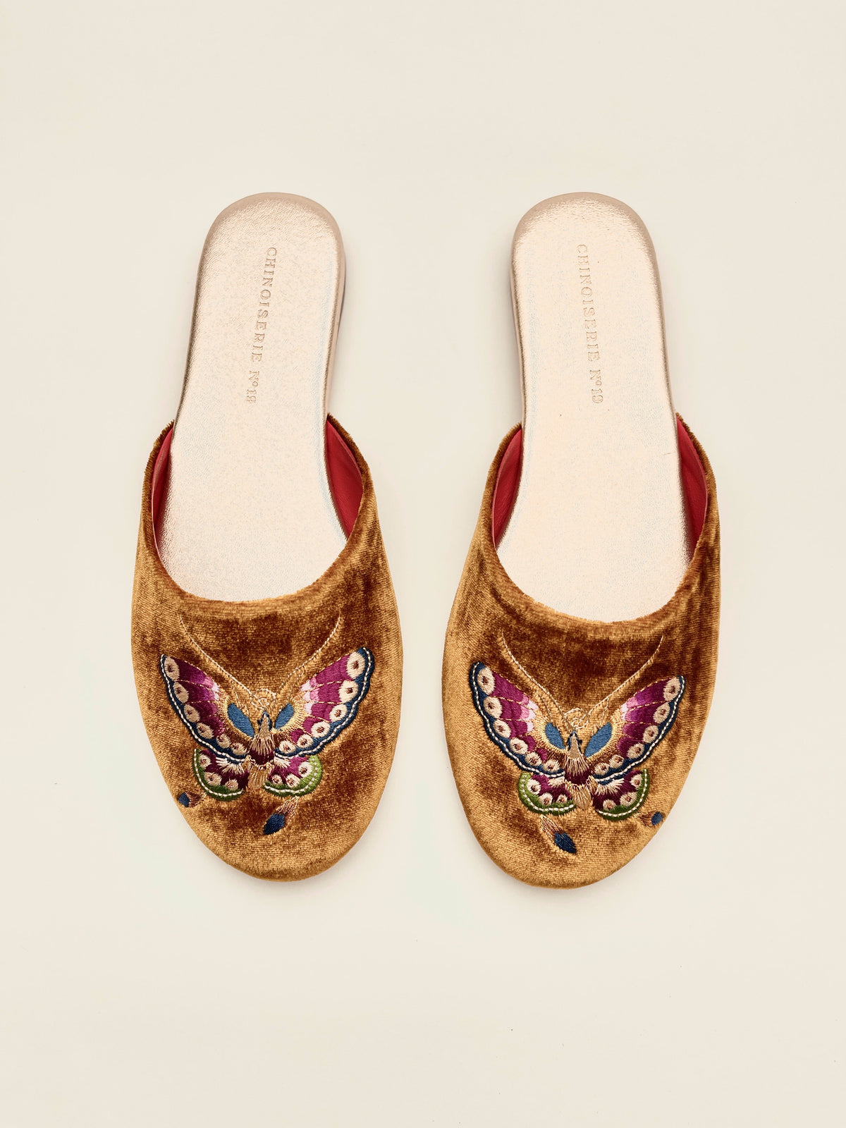 Velvet mules with butterfly embroidery and red lining, antique gold color
