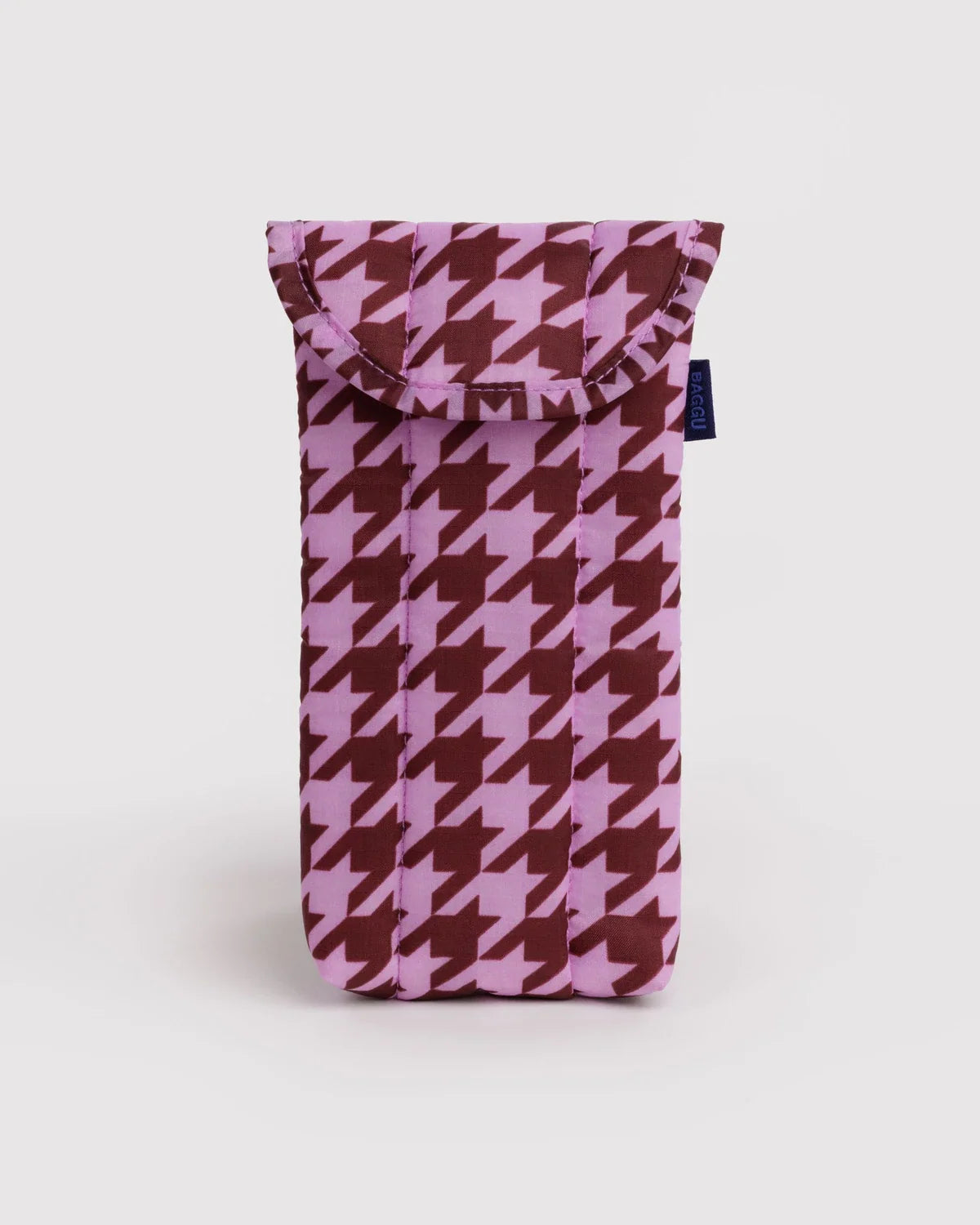 Baggu puffy glasses sleeve in pink houndstooth with a flap closure