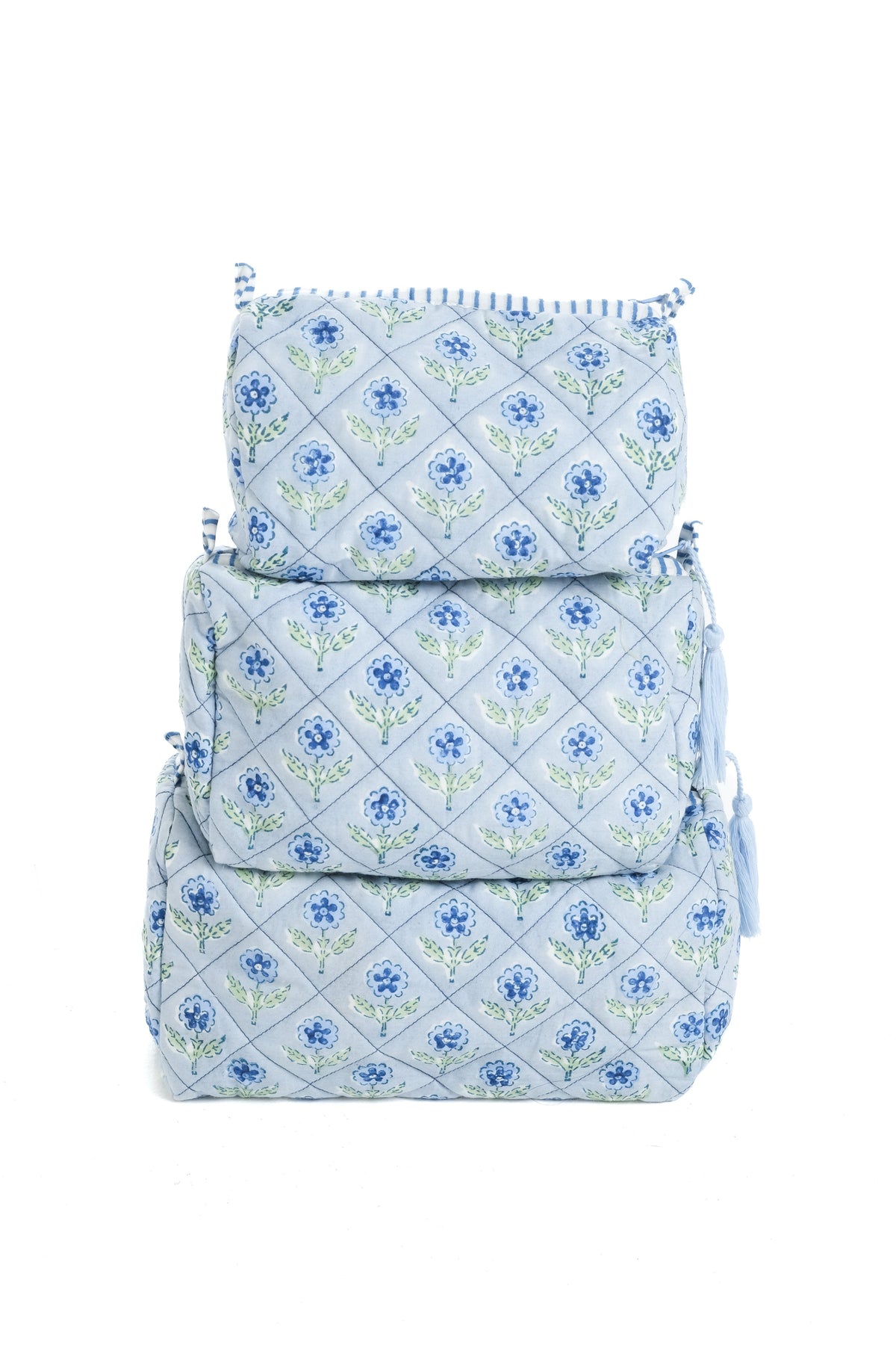 Blue blockprint makeup bag with quilted diamond pattern and drawstring tassel
